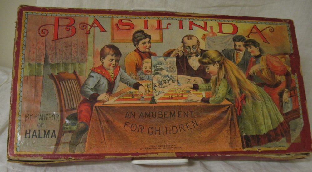 Vintage "BASILINDA" board game cover featuring illustrations of a family engaging in play, with text "An Amusement for Children" and "By Author of Halma." The cover shows wear and tear indicative of its age.