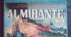 Vintage board game box cover with the title "ALMIRANTE", featuring a painted naval battle scene and text advertising strategy, action, luck, and competition for ages 8 and up.