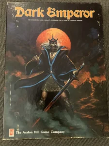 "Dark Emperor" board game cover showing a sinister figure in dark robes holding a scepter, standing before a fiery backdrop with a large moon behind. The Avalon Hill Game Company logo is visible at the bottom.