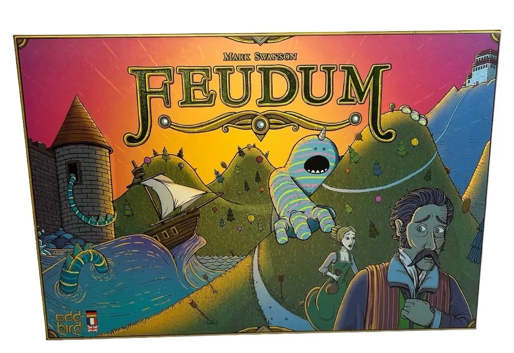 Board game cover art for "Feudum," featuring a fantastical landscape with a whimsical blue monster, medieval towers, a ship on a wave, and a perplexed bearded man in period clothing.