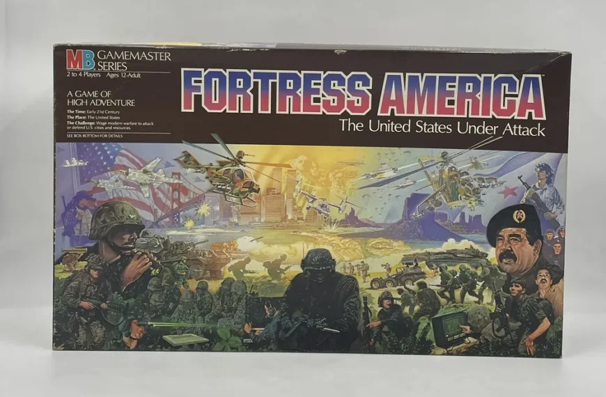 A board game titled "FORTRESS AMERICA" with the subtitle "The United States Under Attack" featuring an illustration of military figures, helicopters, and tanks on the cover.