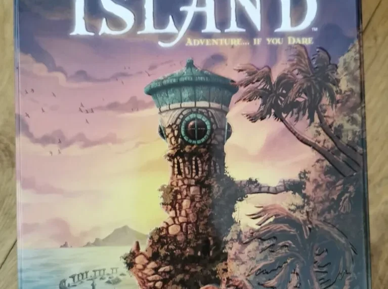 A board game box titled "Forbidden Island" by Gamewright, with an artistic depiction of a lighthouse on a cliff, palm trees, and a sunset sky. Text on the box indicates it's for 2-4 players, ages 10 and up.