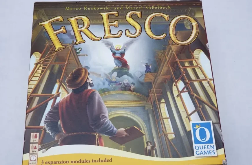 Box cover of the board game "Fresco" showing a Renaissance painting scene with artists on scaffolds, 3 expansion modules included, by Queen Games.