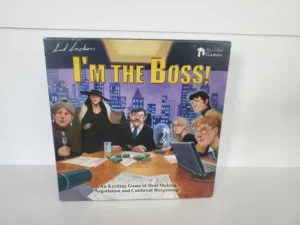 Board game "I'm the Boss!" by Sid Sackson, published by Face 2 Face Games, depicting cartoon-style characters engaging in a business meeting with a cityscape background. The cover art shows a mix of men and women at a conference table with money and documents, advertising the game as an exciting deal-making, negotiation, and cutthroat bargaining game.