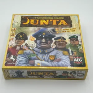A board game box for "JUNTA," labeled "The Classic Game in a New Outfit" featuring illustrated caricatures of military figures in uniforms, with the logos of publishers Pegasus Spiele and AEG.