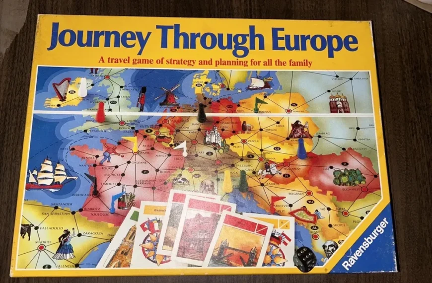 Board game "Journey Through Europe" displayed on a table, including a colorful map of Europe, game pieces, cards, and dice, with the logo "Ravensburger" on the bottom right corner.