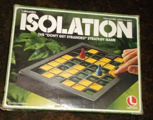 An old board game box for "ISOLATION", labeled as the "DON'T GET STRANDED" strategy game by Lakeside, featuring a grid board with yellow and black squares and two playing pieces, red and blue, with a hand making a move.