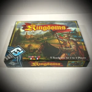 A boxed board game titled "Reiner Knizia's Kingdoms" for 2 to 4 players, with medieval-style artwork featuring a knight on horseback on the cover.