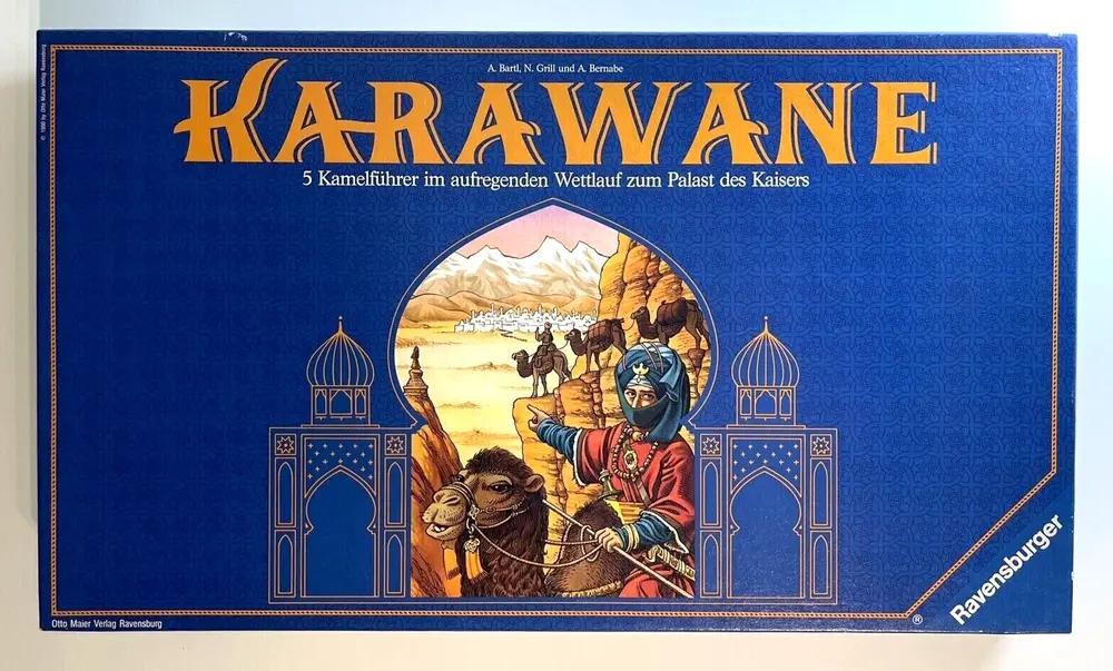 A board game cover titled "KARAWANE" with an illustration of a camel rider against a desert backdrop and the words "5 Kamelführer im aufregenden Wettlauf zum Palast des Kaisers." It features the Otto Maier Verlag Ravensburg logo and is by Ravensburger.