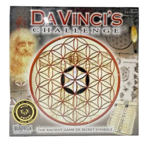 The image displays the board game "Da Vinci's Challenge" with its box cover art featuring a portrait of Leonardo da Vinci, overlaid with geometric patterns and symbols. The game is labeled as "THE ANCIENT GAME OF SECRET SYMBOLS" and has won a gold seal "BEST TOY AWARD" from Oppenheim Toy Portfolio. The intended audience is ages 8 and up, for 2 or 4 players.
