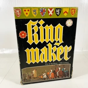 A board game titled "Kingmaker" depicting medieval imagery and styled text on the boxcover, with the subtitle "War of the Roses – 15th Century" and a small illustration of knights and nobles at the bottom. The top border is adorned with various coats of arms.