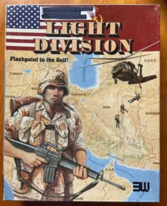 Board game cover art for "Light Division: Flashpoint in the Gulf" featuring an illustrated soldier in desert camouflage holding a rifle, a map showing parts of the Middle East in the background, a helicopter dropping off troops, and the American flag with title text overlay.