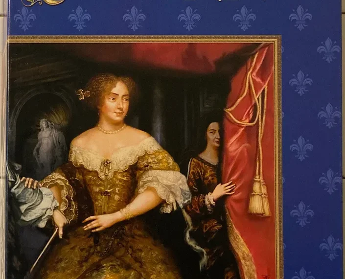 Alt text: "Board game cover for 'Louis XIV' featuring an elaborate painting of a woman in a golden dress, with another figure behind her, against a blue background with golden fleur-de-lis. The cover includes the text 'Rüdiger Dorn,' 'Louis XIV,' and 'Strategy game in the court of the Sun King,' along with the logos 'alea' and 'Rio Grande Games'."