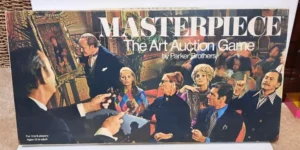 A vintage board game titled "MASTERPIECE The Art Auction Game by Parker Brothers," featuring an illustration of an animated art auction scene with various characters bidding. The box indicates it is for 3 to 6 players, ages 12 to adult.