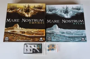 Board games "Mare Nostrum Empires" and "Mare Nostrum Atlas" with game components including cards and tiles displayed in front.