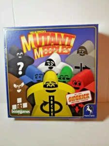 Board game titled "Mutant Meeples" by Ted Alspach, featuring colorful meeple characters with superhero motifs, with a badge indicating an included sidekick expansion, produced by Bezier Games and Pegasus Spiele.