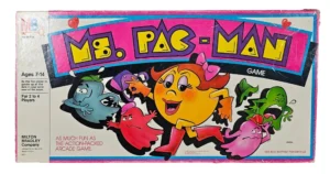 Vintage "Ms. PAC-MAN" board game box by Milton Bradley Company, depicting the character Ms. Pac-Man with four colorful ghosts, aimed for ages 7-14 and for 2 to 4 players.