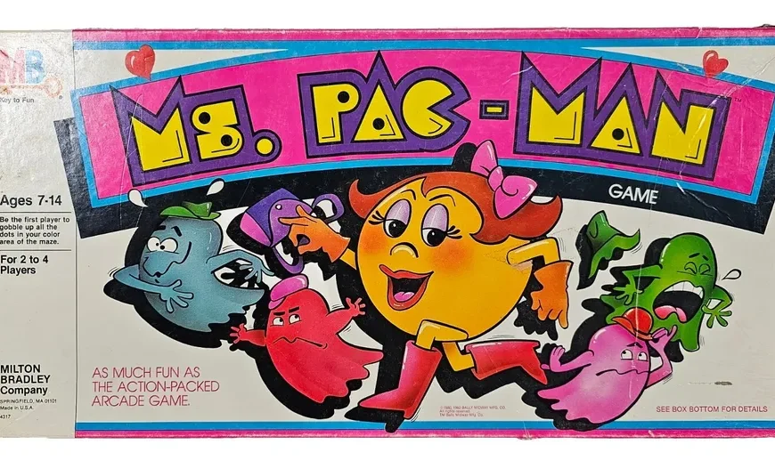 Vintage "Ms. PAC-MAN" board game box by Milton Bradley Company, depicting the character Ms. Pac-Man with four colorful ghosts, aimed for ages 7-14 and for 2 to 4 players.