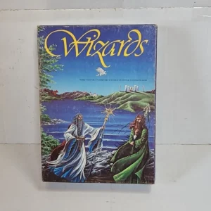 Alt text: A photo of a board game cover with the title "Wizards" in large, elaborate font at the top. The artwork features two wizards, one in blue robes and one in green, holding staffs by the shore of a lake with a dragon flying in the distance and a castle on a hilltop.