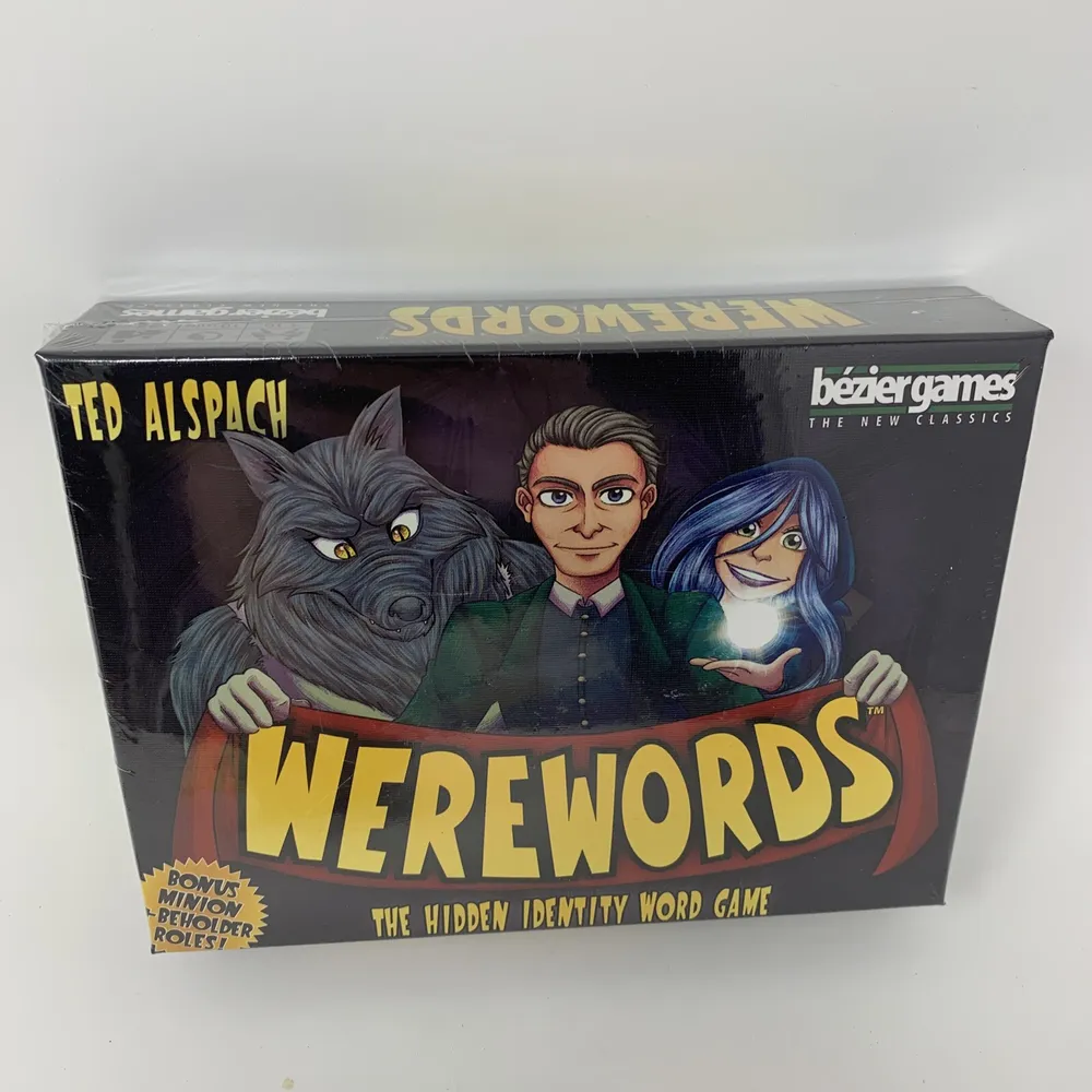 A sealed board game called "Werewords" by Ted Alspach and published by Bezier Games sits on a white background. The cover illustration features a cartoon-style drawing of a man flanked by a wolf-like creature on his left and a woman with blue hair on his right. The box includes a note about a bonus of "Mini Werewolf Roles."