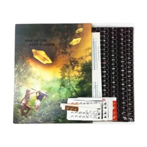 A collection of books laid flat, with the topmost visible cover titled 'WAR OF THE STAR SLAVERS' featuring an artistic rendering of two figures with a weapon, looking at a sky with descending spaceships, and other books with spines showing various symbols and text.