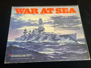 Vintage "War at Sea" board game cover with a dramatic illustration of naval ships and airplanes at sea, along with promotional text and the Avalon Hill Game Company logo.