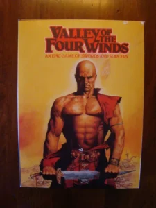 Box cover for "Valley of the Four Winds" board game featuring a muscular fantasy warrior in red garments with a sword resting in front of him against an orange background.