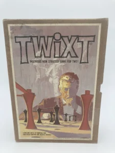 A vintage board game box for "TwixT", labeled as an ingenious new strategy game for two, featuring artwork of abstract game pieces and a faded image of a thinking man, with text stating it's a brilliant battle of barriers that challenges wit and tactical thinking, copyrighted 1962 by Minnesota Mining and Manufacturing Company.
