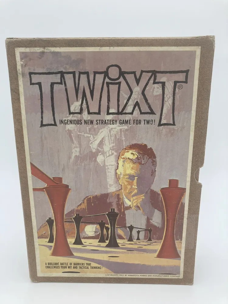A vintage board game box for "TwixT", labeled as an ingenious new strategy game for two, featuring artwork of abstract game pieces and a faded image of a thinking man, with text stating it's a brilliant battle of barriers that challenges wit and tactical thinking, copyrighted 1962 by Minnesota Mining and Manufacturing Company.