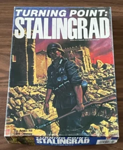 Board game titled "Turning Point: Stalingrad" by The Avalon Hill Game Company, depicting a soldier with a rifle standing amidst rubble.