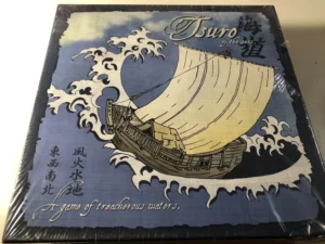 A sealed board game box for "Tsuro of the Seas" featuring a stylized drawing of a ship with a large sail on a sea with waves, with the tagline "A game of treacherous waters" at the bottom.