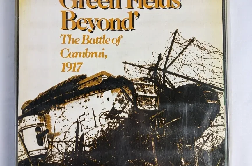 Box cover of "To the Green Fields Beyond" historical simulation game depicting a damaged tank in a battlefield setting, with text detailing the Battle of Cambrai, 1917.