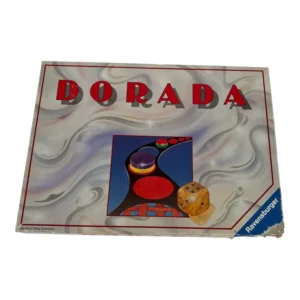 A board game box titled "DORADA" with abstract artwork, dice, and playing pieces on the cover, by Otto Maier Verlag Ravensburg, showing some wear on the edges.