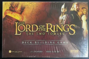 Box cover for "The Lord of the Rings: The Two Towers Deck-Building Game" featuring title text and images of characters from the film, labeled for 2-5 players, ages 15 and up, by Cryptozoic Entertainment.