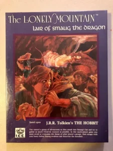 Alt text: A board game cover titled "The Lonely Mountain: Lair of Smaug the Dragon™," featuring a colorful illustration of adventurers and a fiery dragon, based on J.R.R. Tolkien's "The Hobbit." The artwork depicts intense expressions and a dynamic scene suggestive of an epic encounter. The logo of I.C.E. (Iron Crown Enterprises) is visible at the bottom left corner.
