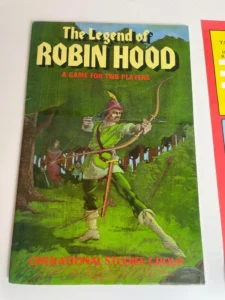 Board game cover titled "The Legend of Robin Hood - A Game for Two Players" by Operational Studies Group, featuring an illustration of Robin Hood drawing a longbow in a green forest setting.