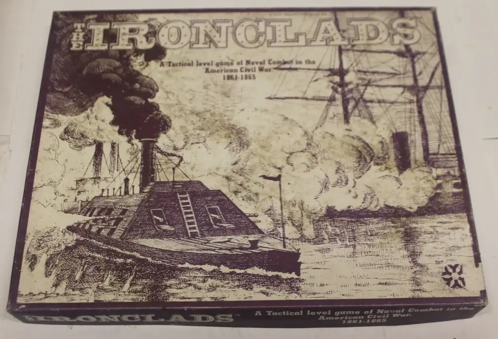 An image of the board game "Ironclads: A Tactical Level Game of Naval Combat in the American Civil War 1861-1865" showing the box cover with an illustration of warships engaged in battle.