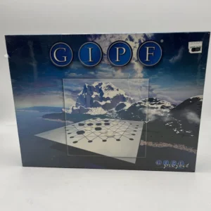 A photo of the GIPF board game in its original packaging, featuring a mountainous landscape in the background and an image of the game board with black and white pieces on the cover.