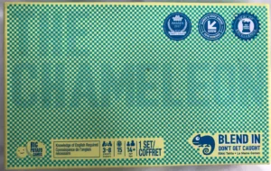 A board game cover with a checkerboard pattern background in shades of blue and green. The cover includes award badges for “BGG Awards 2017 Party Game” and “SXSW 2018 Nominee” in the top right corner. The logo of Big Potato Games, the phrase “Knowledge of English Required,” a player range of "3-8 players," age "14+," and playtime "15 min" are on the bottom left. The bottom right features the phrases "1 SET/COFFRET," "BLEND IN," and "DON'T GET CAUGHT," along with an illustration of a chameleon.