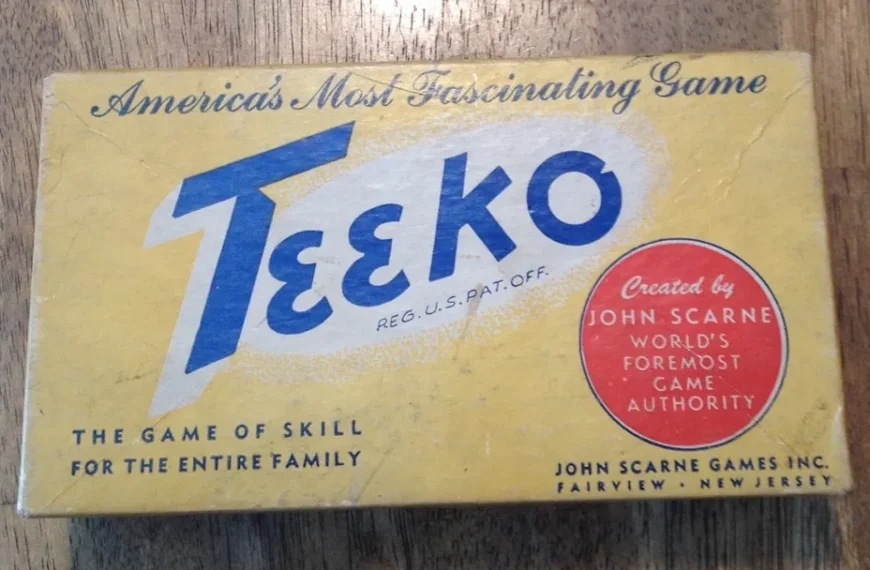 Vintage Teeko board game box with text "America's Most Fascinating Game" and "The Game of Skill for the Entire Family," highlighting creator John Scarne, labeled as the world's foremost game authority.