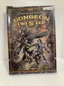 A "Dungeon Twister" board game box on a white surface with artwork showing a knight battling monsters in a steampunk-like dungeon setting. The box has a plastic wrap and is labeled with a price sticker indicating "1/29" and "68."