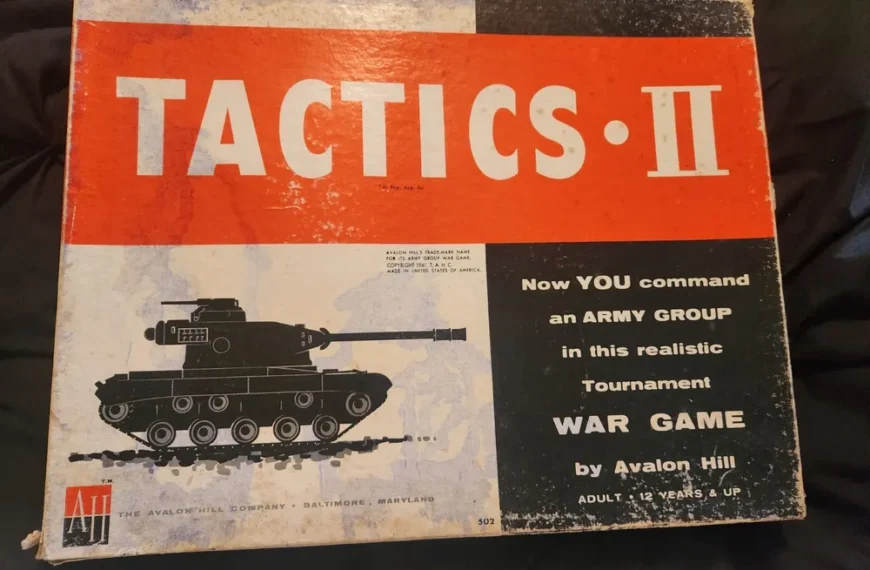 The image shows an old, worn board game box titled "TACTICS II" with a picture of a tank and text promoting the game as a realistic army group war game by Avalon Hill, suitable for adults and children 12 years and up. The Avalon Hill Company logo is visible at the bottom left.