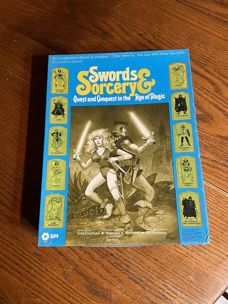A board game called "Swords & Sorcery" on a wooden surface, featuring cover art with fantasy characters and marked with game design credits.