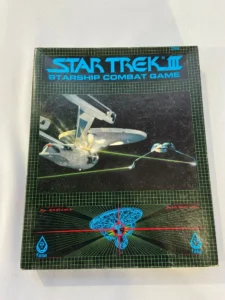 Box cover of the "Star Trek III Starship Combat Game," featuring images of starships in battle, displayed on a background designed with grid lines, with the "FASA" logo at the bottom.