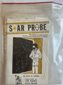 Vintage "Star Probe" tabletop game manual by John M. Snider, published by TSR Games, priced at $6.00, featuring a graphic of a space explorer in a spacesuit next to a starry background, enclosed in a protective plastic sleeve.