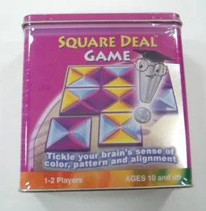 A photo of the "Square Deal Game" box featuring colorful geometric patterns and a cartoon pencil character with glasses; the box mentions it is suitable for 1-2 players aged 10 and up.