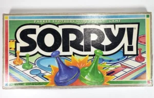 Box cover of the board game "Sorry!" by Parker Brothers featuring colorful game pieces and a bold title.