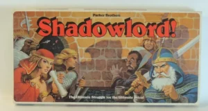 A board game box titled "Shadowlord!" by Parker Brothers, featuring fantasy artwork with various characters such as a warrior, sorceress, eagle-like creature, and a wizard against a brick wall background, with the subtitle "The Ultimate Struggle for the Ultimate Prize!"