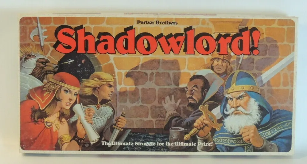 A board game box titled "Shadowlord!" by Parker Brothers, featuring fantasy artwork with various characters such as a warrior, sorceress, eagle-like creature, and a wizard against a brick wall background, with the subtitle "The Ultimate Struggle for the Ultimate Prize!"