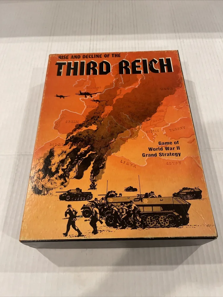 A board game titled "Rise and Decline of the THIRD REICH: A Game of World War II Grand Strategy" with an illustration of a map, soldiers, and military vehicles on the cover, displayed on a white surface.